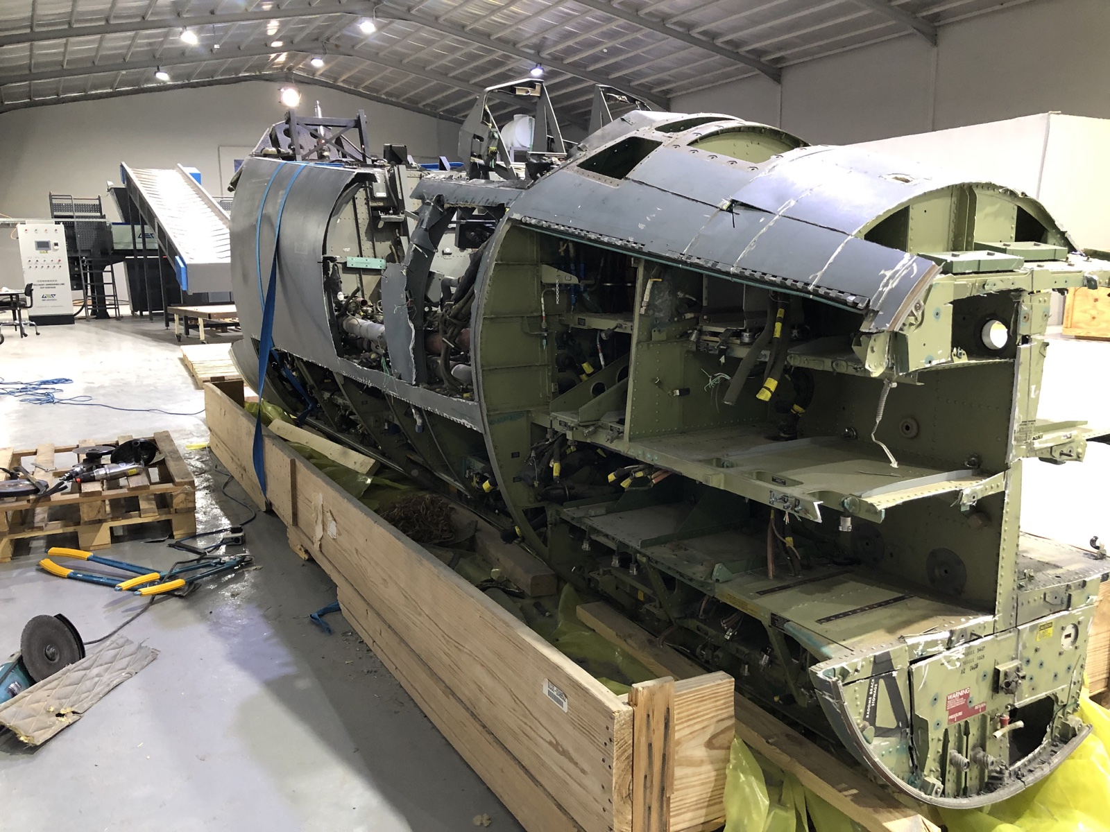 F-15 airframe undergoing demilitarization work
