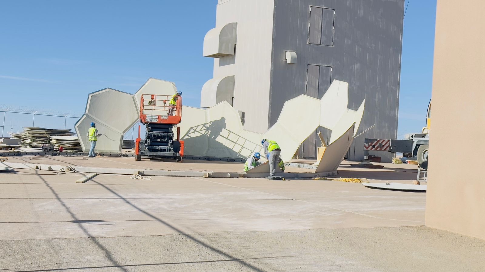 Field technicians working on radar infrastructure
